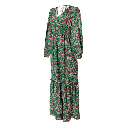 A stylish printed lantern sleeve dress with a v-neck and halter design, perfect for elevating your wardrobe.