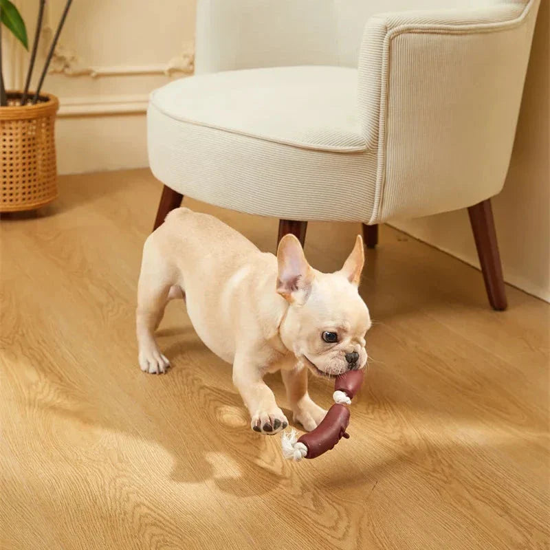 A durable cotton rope and vinyl sausage chew toy for pets, designed to provide interactive play and promote dental health.