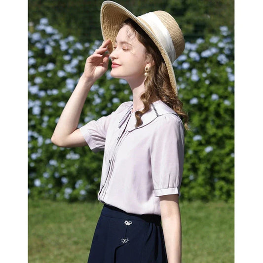 Elegant French puff sleeve blouse with timeless Peter Pan collar, available in purple and various sizes