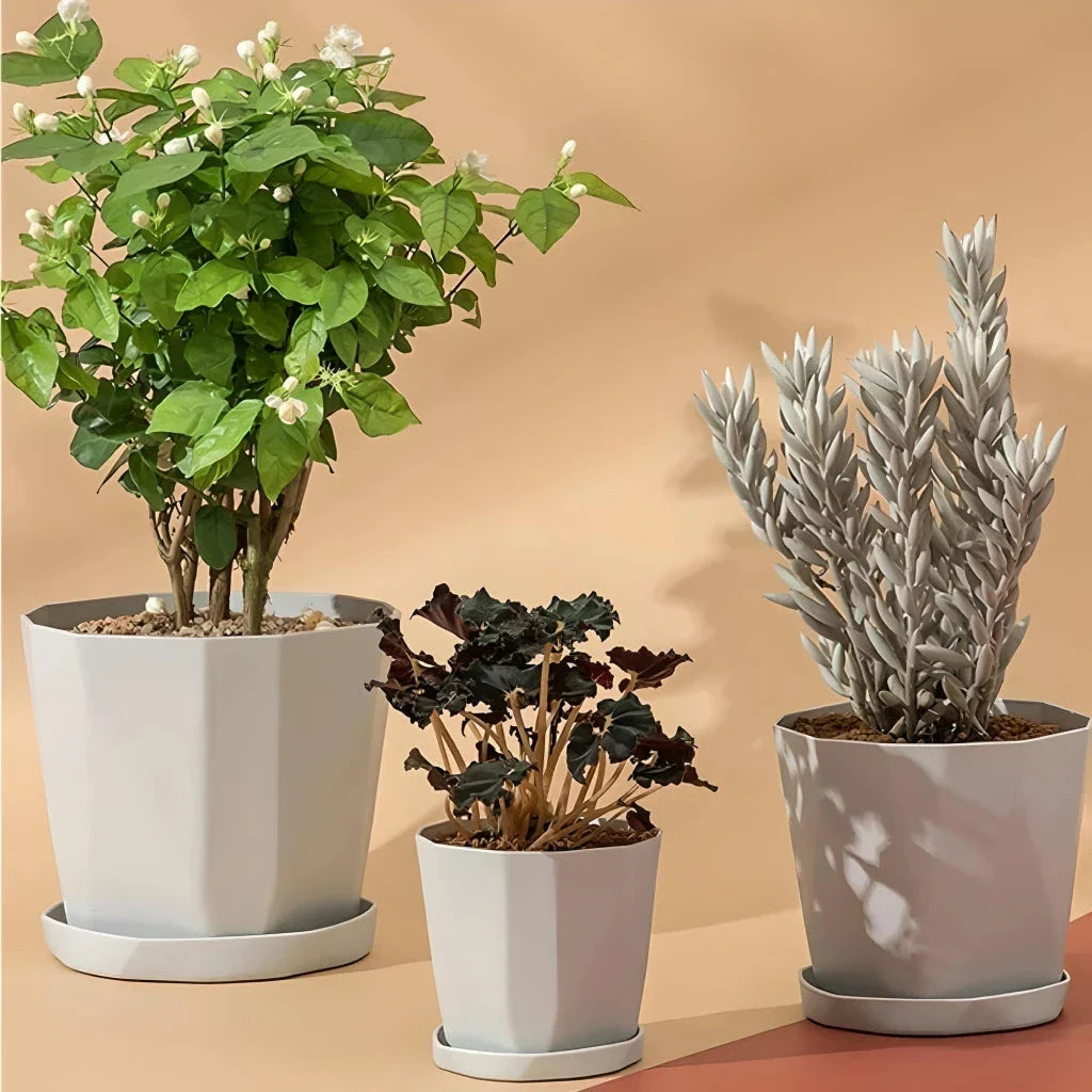 Nordic-style resin flower pot in grey, featuring a minimalist design and suitable for indoor use in UK homes and offices
