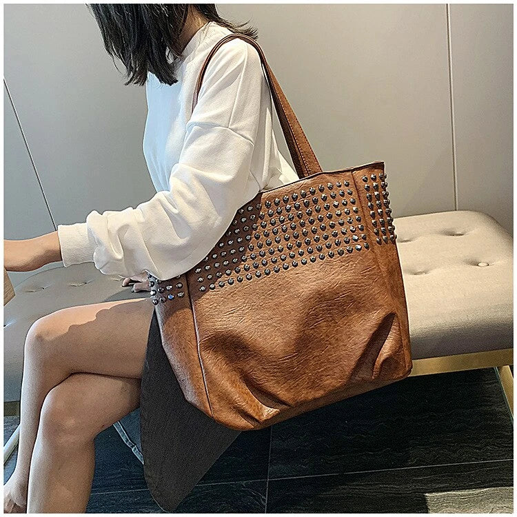 Premium British leather tote bag in black, featuring a large capacity design and stylish, versatile appeal.