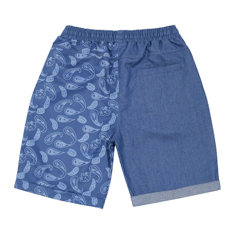 Relaxed-fit sports shorts in light blue and denim blue mosaic patterns, designed for casual everyday wear
