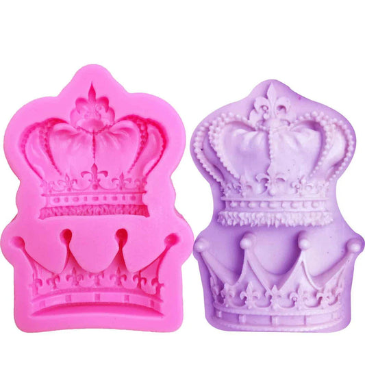 Elegant crown-shaped silicone fondant mould in vibrant pink colour for creating regal-inspired baked goods