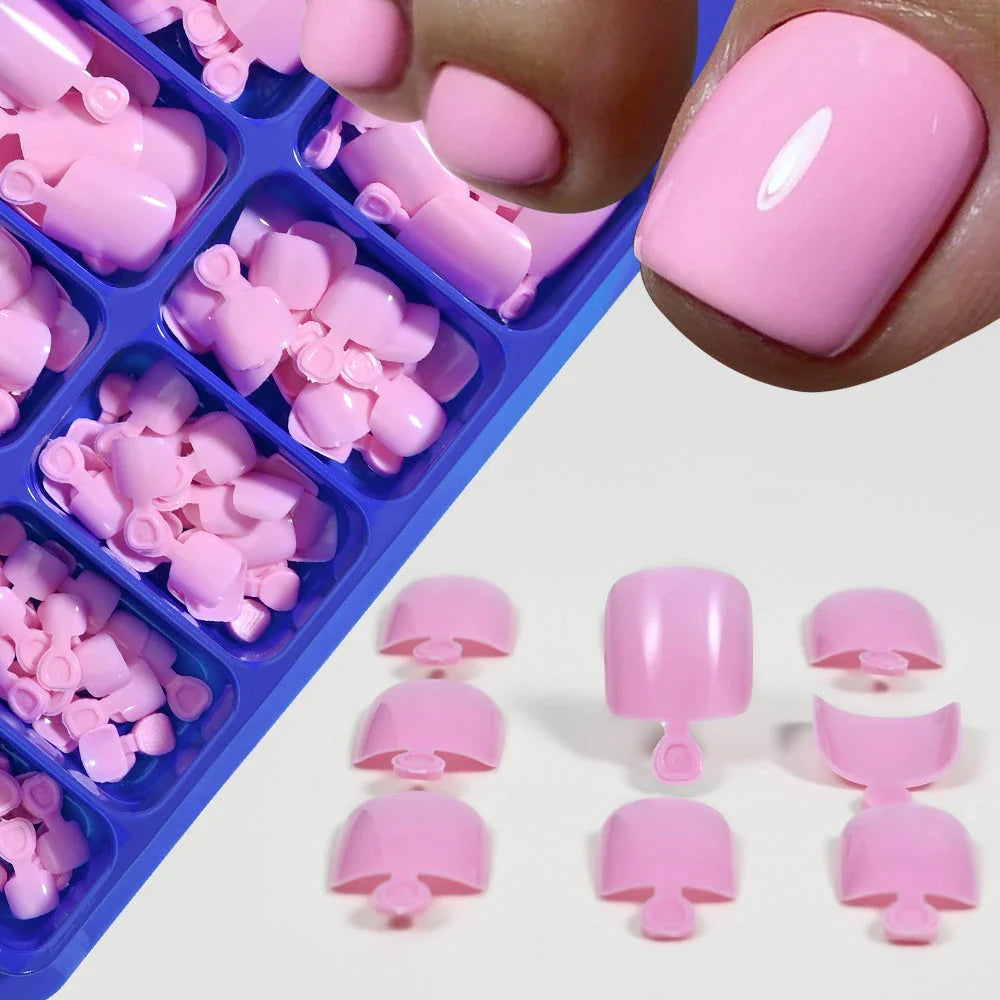 Elegant short square press-on toenails in vibrant pink, red, and nude shades for a polished and convenient pedicure