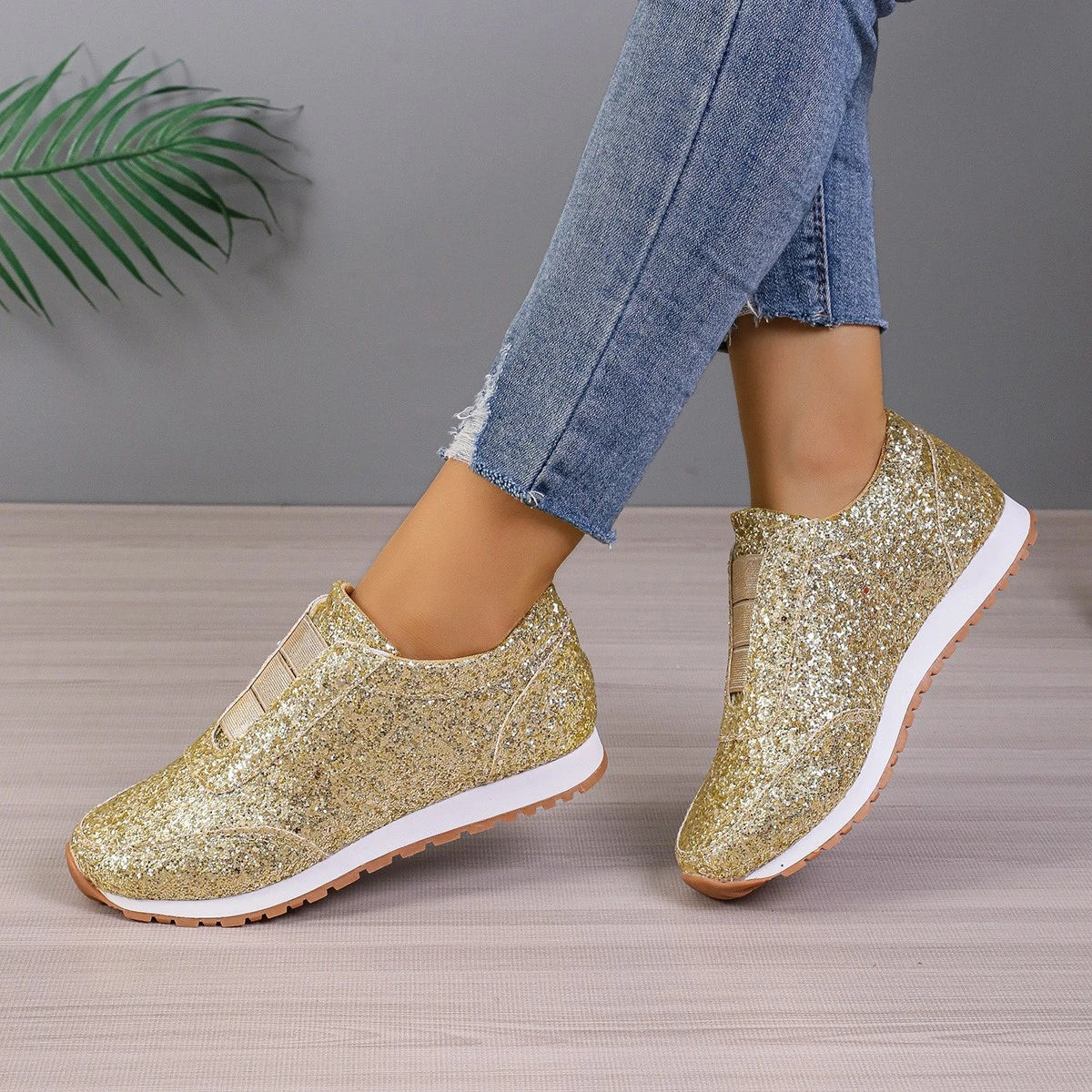 Premium sequinned flats with round toe and slip-on design, perfect for casual wear and special occasions.