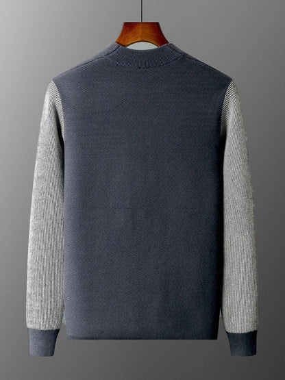 Men's knitted jumper with contrast sleeves, made from premium wool-blend fabric for superior quality and comfort.