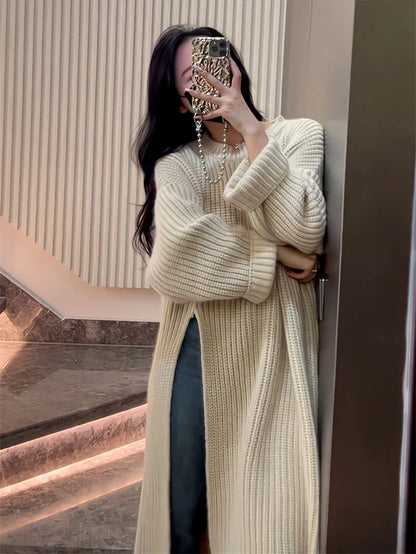 Relaxed mid-length jumper dress in a variety of colours, featuring an A-line silhouette and premium knit fabric for a comfortable, flattering fit.