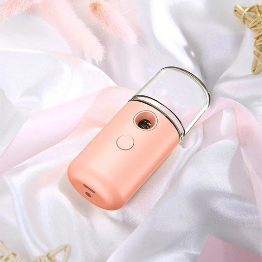 Compact USB Powered Nano Facial Mist Sprayer in pink colour for deep hydration and a radiant glow