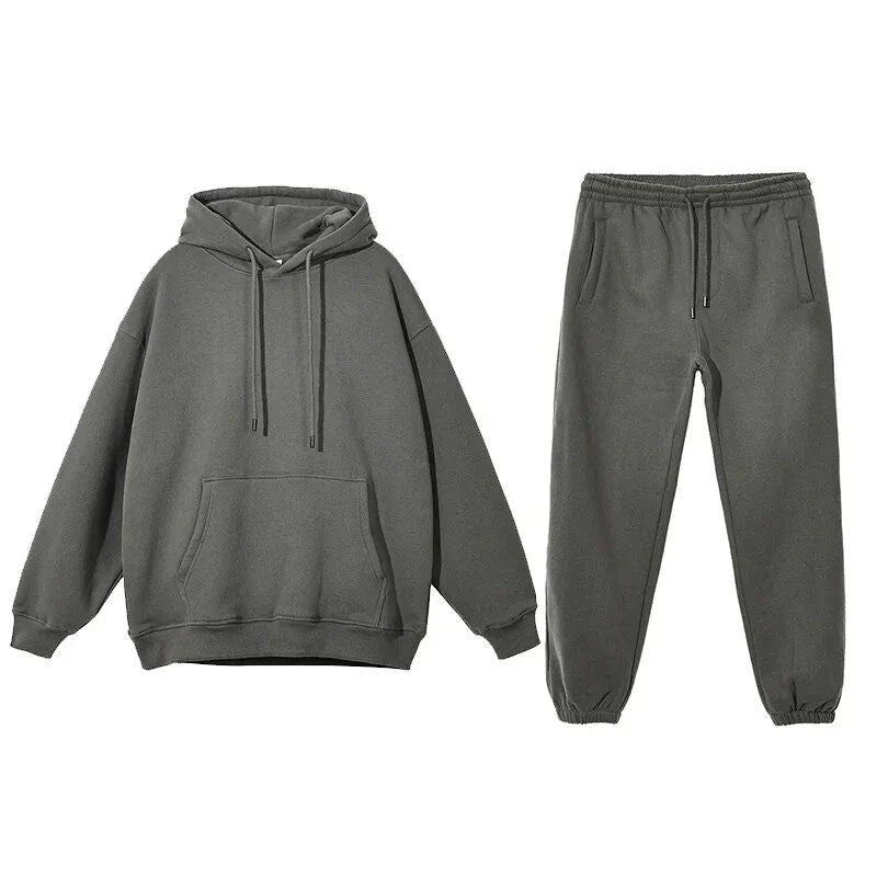 Cosy fleece hoodie and jogger set in light pink, grey, and navy blue colours for ultimate comfort and style