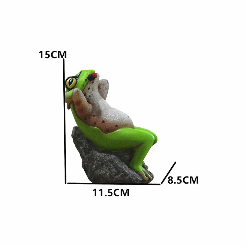 Charming resin frog garden ornaments in various poses and colours, perfect for adding a whimsical touch to outdoor spaces.