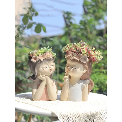Charming 7.8-inch fairy girl planter made of high-quality resin with hand-painted details, perfect for succulents and small plants