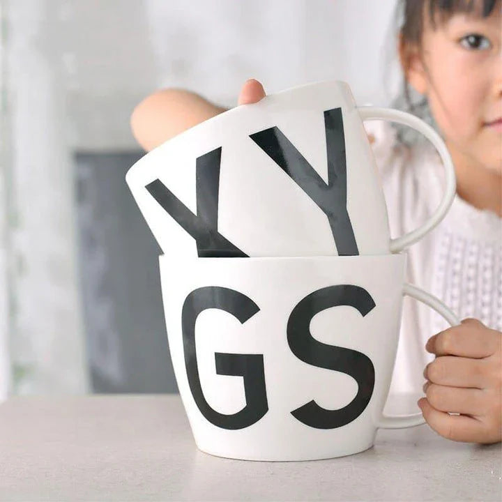 Premium personalised ceramic mug with initial design, offering a stylish and functional solution for daily beverages
