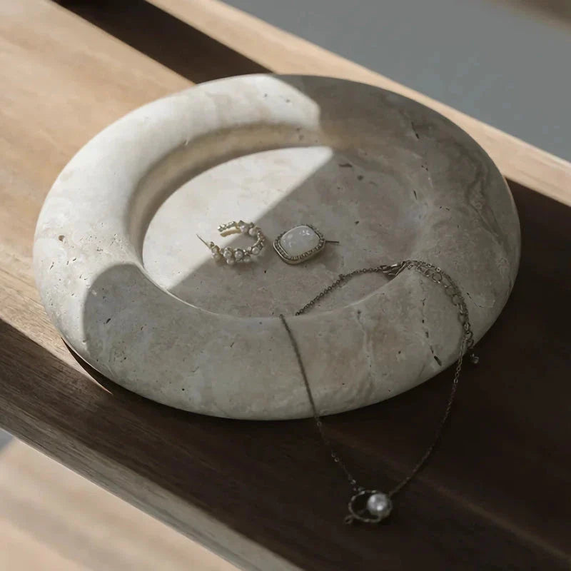 Elegant travertine serving tray with a smooth, round design and neutral beige colour for versatile home decor use