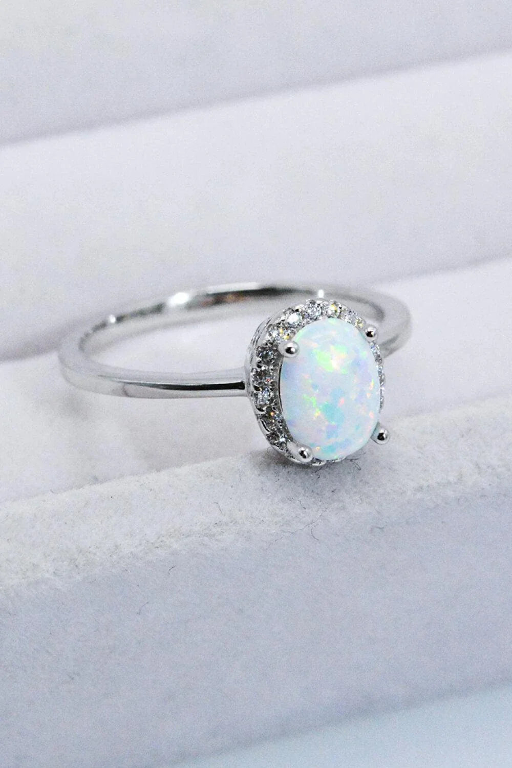 Premium 925 sterling silver ring featuring a captivating Australian opal gemstone, showcasing the enduring craftsmanship of British jewellery design.