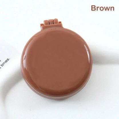Compact folding hair comb with mirror, perfect for on-the-go touch-ups and styling for British customers