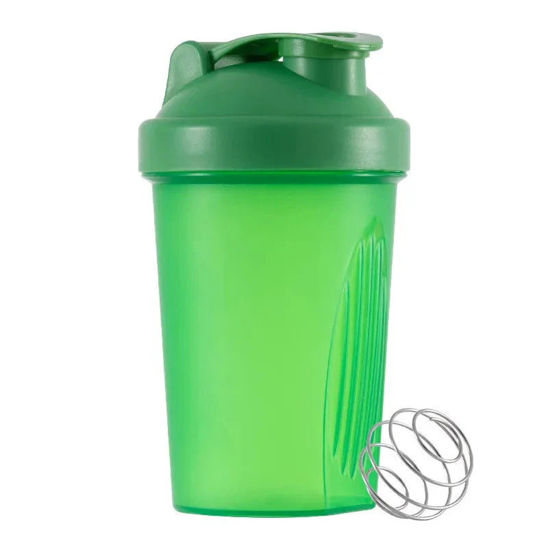 Premium protein shaker bottle with stainless steel whisk ball, BPA-free plastic, and leak-proof design for on-the-go fitness enthusiasts in the UK.