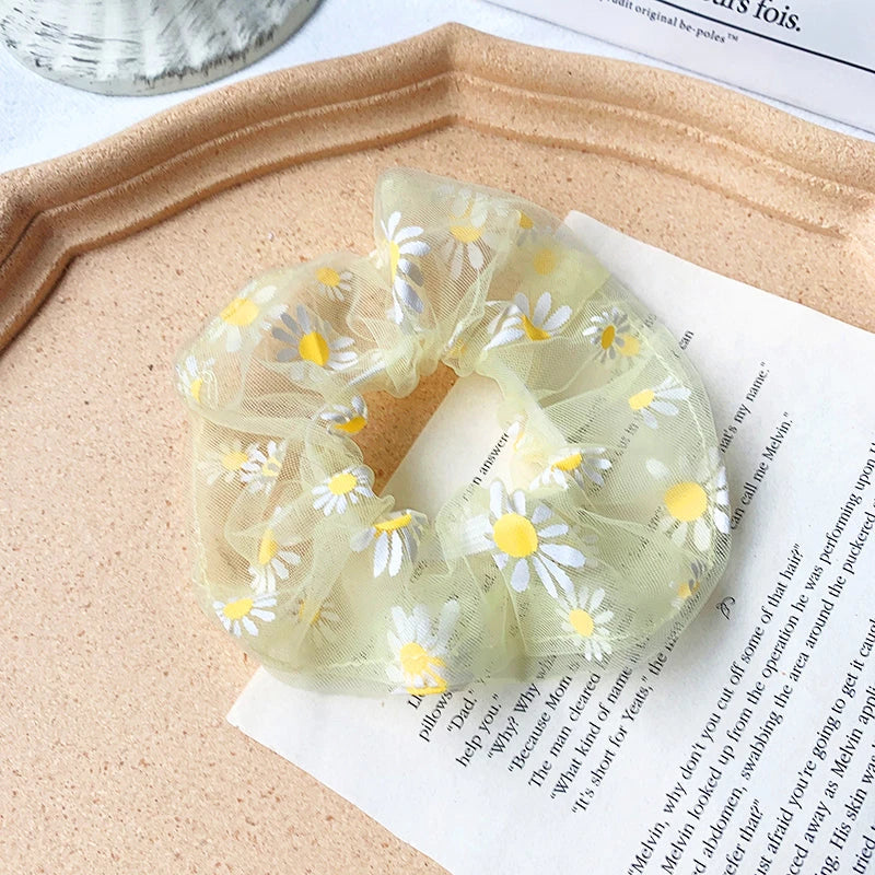 Handmade floral elastic hair bands with soft chiffon fabric and vibrant embroidered daisy patterns, perfect for enhancing everyday style in the UK.