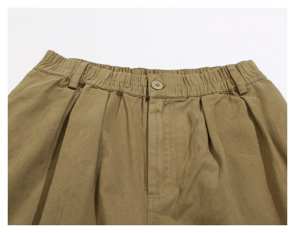 Sophisticated men's casual trousers in various colours, featuring a tailored straight-leg design and mid-rise waistline for a polished, British-inspired look.