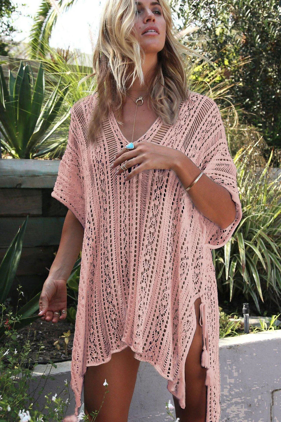 Premium knitted bikini blouse with unique hollow thread design, soft and breathable fabric, and flattering loose silhouette for effortless British summer style