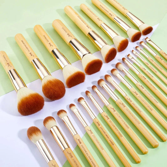 A 25-piece set of high-quality bamboo makeup brushes with soft synthetic bristles for flawless makeup application