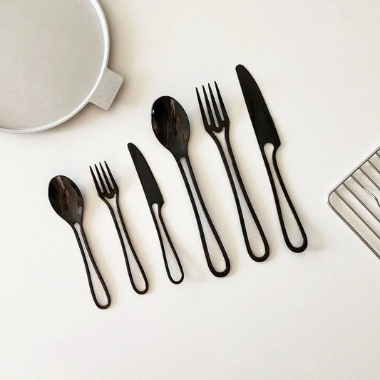 Sophisticated 304 stainless steel cutlery set with sleek black finish for elegant dining in the UK