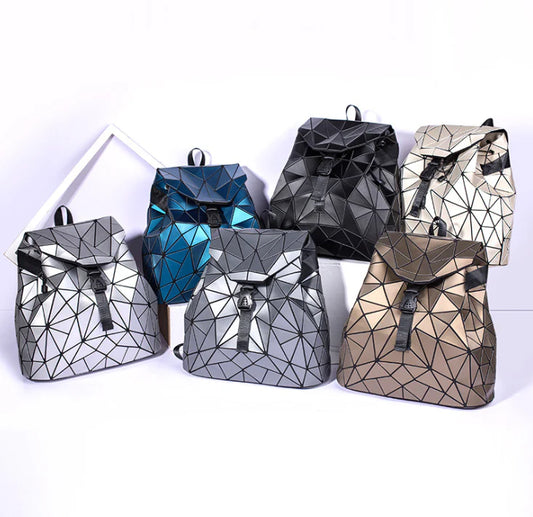 Diamond-patterned backpack in various colours, featuring a sophisticated and contemporary British design