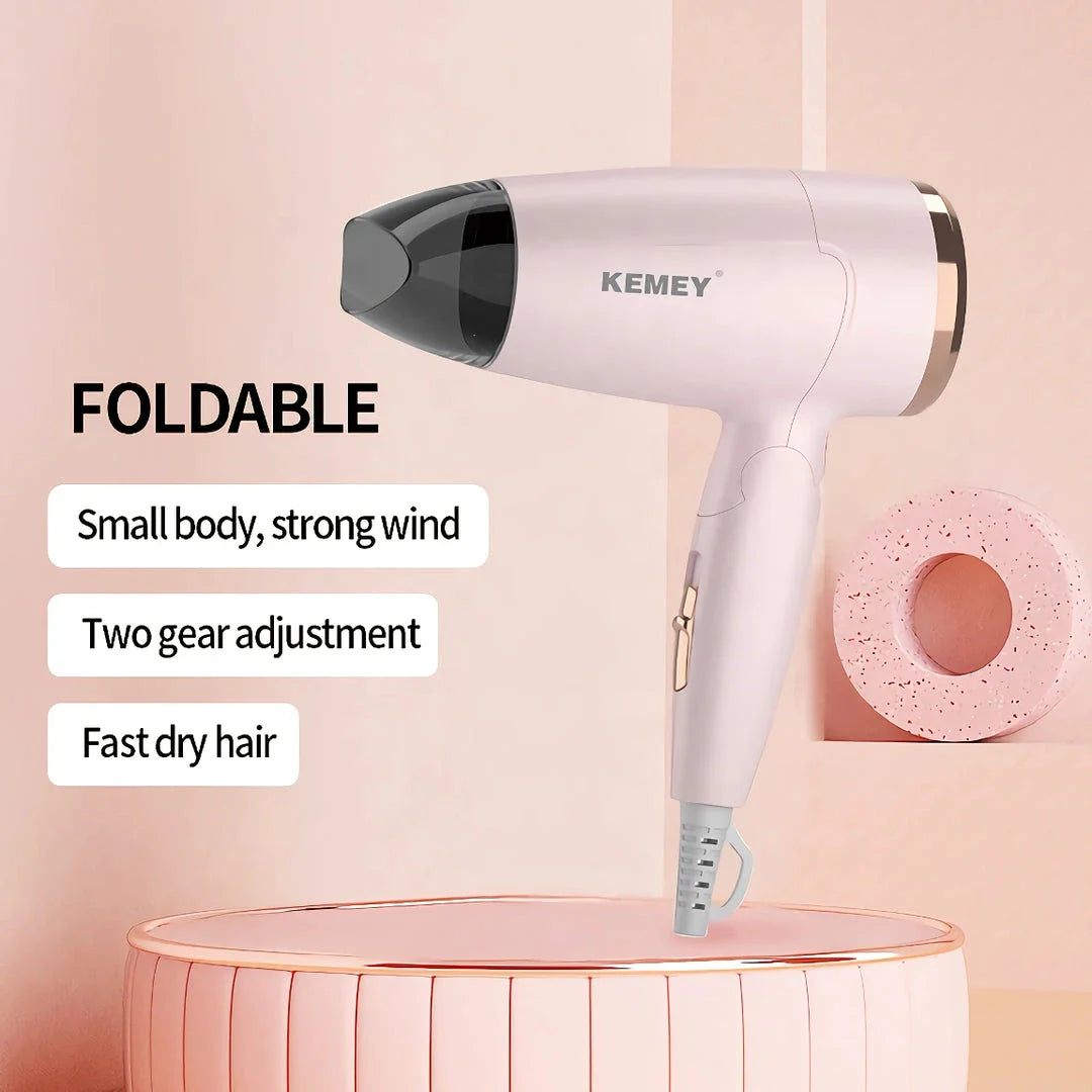 Compact and foldable hair dryer with powerful 950-watt motor for efficient styling on the go