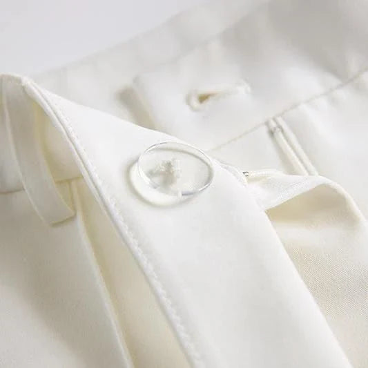Elegant British designer women's suit set with beaded blazer and flare pants in white