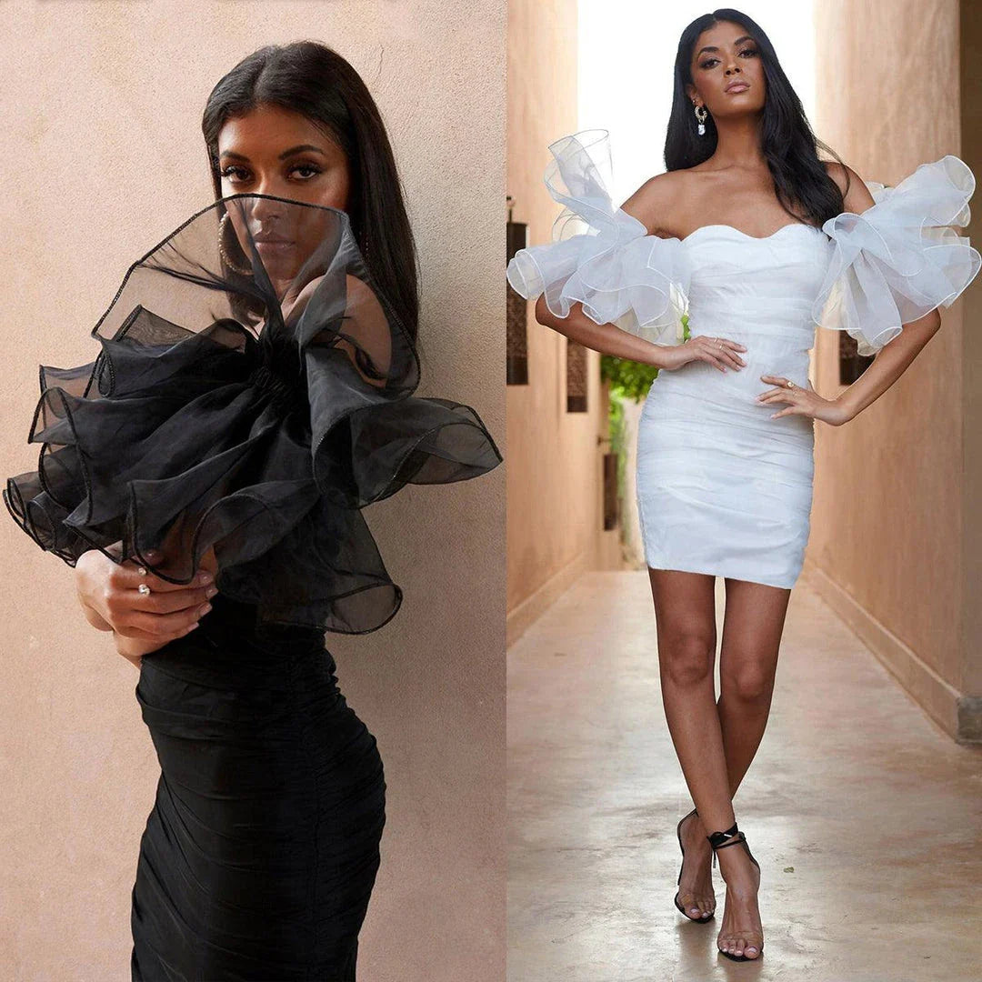 Elegant puff sleeve mesh dress with a flattering short, irregular skirt in white and black colours
