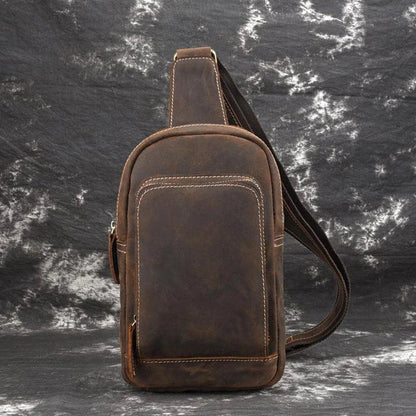Vintage-inspired genuine leather briefcase with multiple compartments and secure zipper closure, ideal for modern commuters