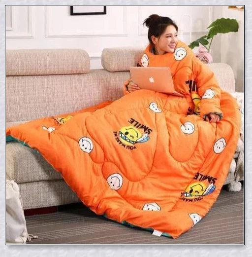 A cosy, wearable quilt with sleeves in a variety of colourful designs, perfect for staying warm and comfortable during the winter months.