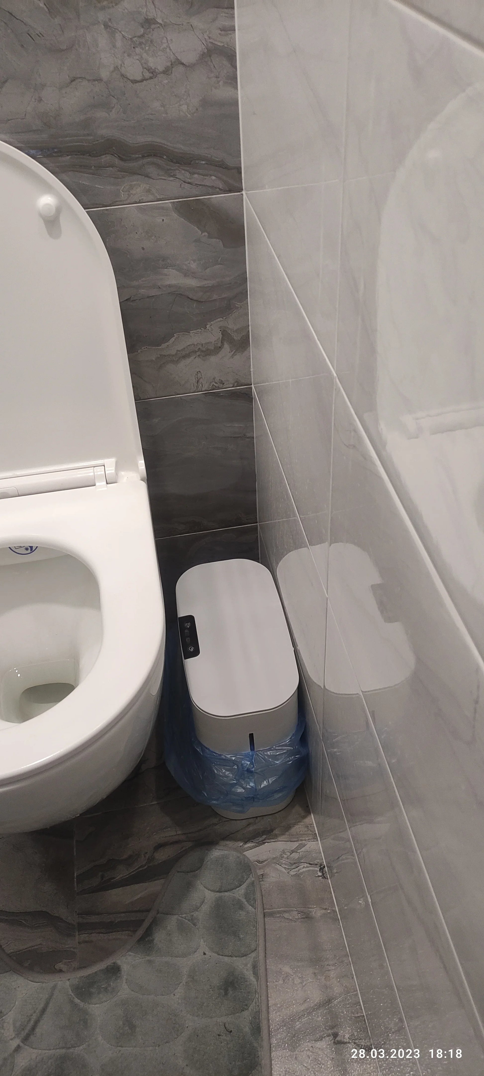 Sensor-powered bin with sleek design and touch-free motion-activated lid for effortless, hygienic waste disposal