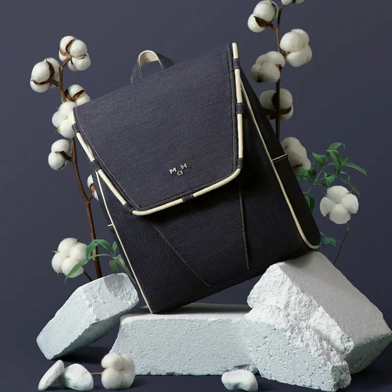Premium eco-friendly denim waterproof backpack with multiple pockets and a comfortable handle for active lifestyles