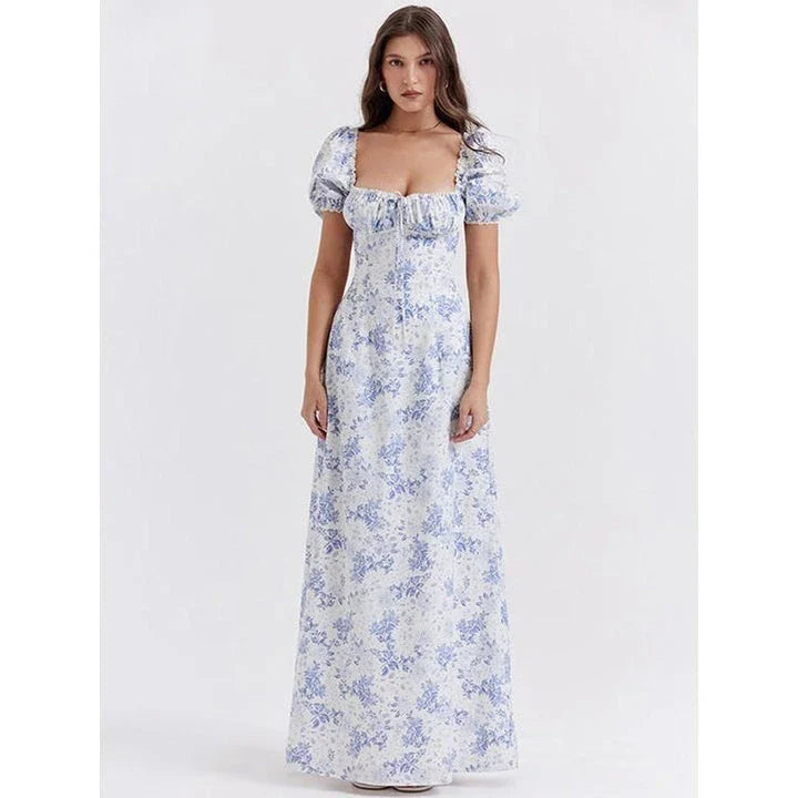 Elegant long maxi summer dress in blue with a flattering fit and flare silhouette, perfect for parties and nights out.