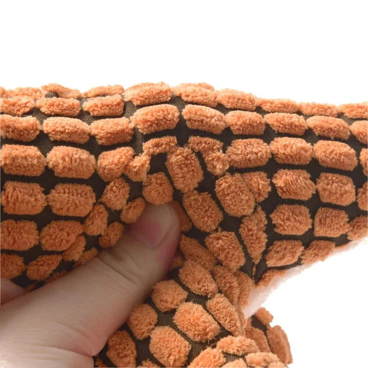 Premium plush dinosaur toys for playful pets in the UK, featuring soft, durable materials and interactive squeaky features for endless fun and companionship.