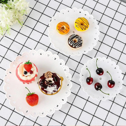 A vibrant multicoloured cake stand made of premium durable plastic, designed to elegantly display desserts and baked goods.