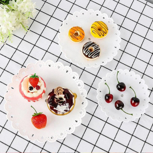 A vibrant multicoloured cake stand made of premium durable plastic, designed to elegantly display desserts and baked goods.