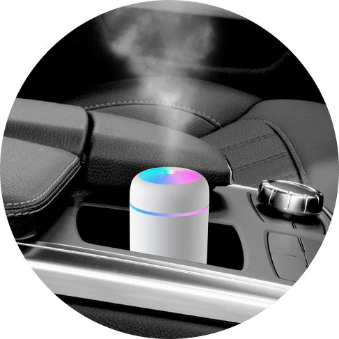 Compact in-car LED humidifier with rainbow mood lighting, designed to freshen and relax your vehicle's interior