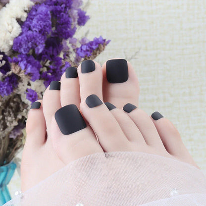 Premium white matte full coverage press-on toenails with secure adhesive for a flawless at-home pedicure