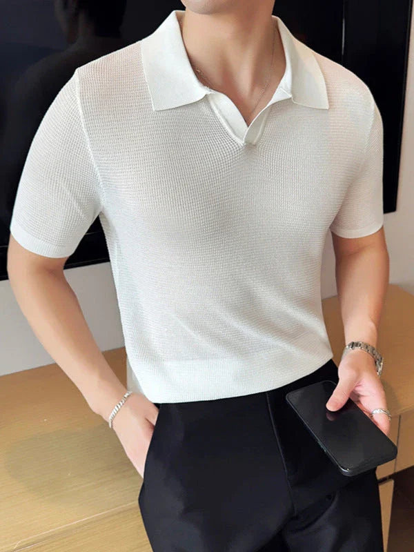 A premium cotton blend polo shirt in classic colours, featuring a v-neck lapel collar and slim fit design for a sophisticated casual look.