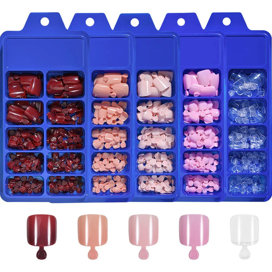 Elegant short square press-on toenails in vibrant pink, red, and nude shades for a polished and convenient pedicure