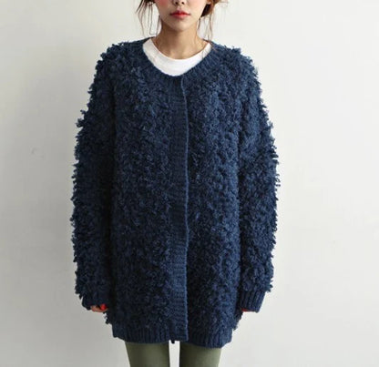 Women's cosy knitted jumper coat in a range of sophisticated colours, featuring a premium mohair blend and timeless British-inspired design.