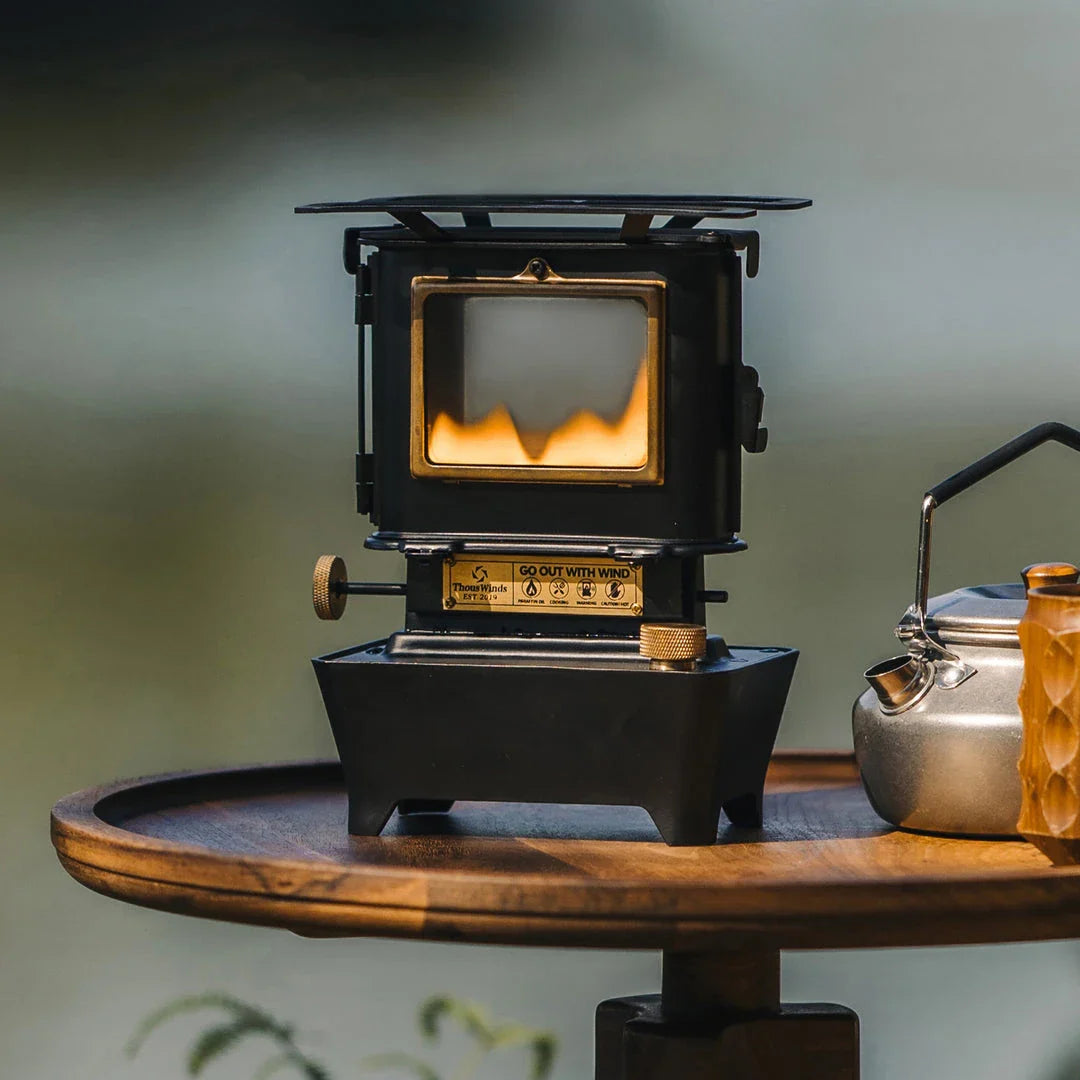 Retro Oil Lamp Stove with brass and stainless steel construction, providing warm light and ambience for outdoor activities in the UK