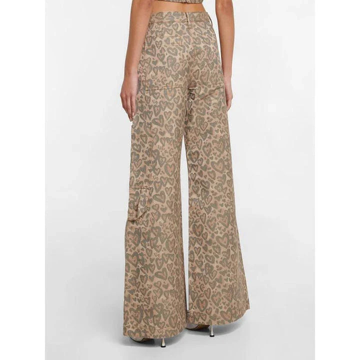 Stylish leopard print wide-leg jeans with patchwork design, perfect for fashion-forward women in the UK
