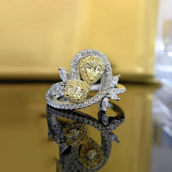 Elegant 925 sterling silver fashion ring with a yellow diamond centre stone