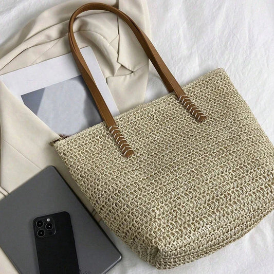 Elegant handcrafted woven straw tote bag in beige colour, perfect for summer outings and carrying essentials