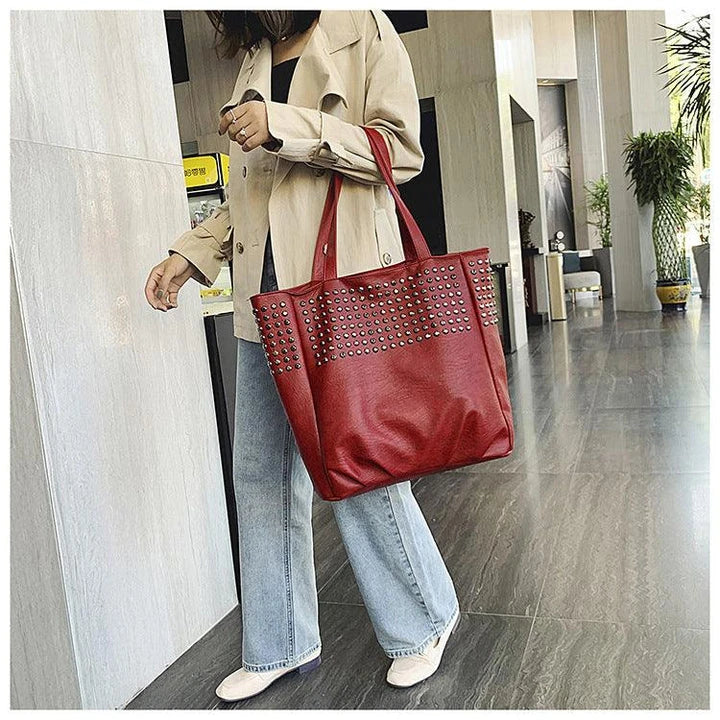Premium British leather tote bag in black, featuring a large capacity design and stylish, versatile appeal.