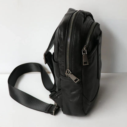 A high-quality leather chest bag in a vertical design, perfect for outdoor activities and adventures.