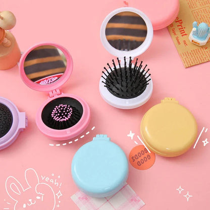 Compact folding hair comb with mirror, perfect for on-the-go touch-ups and styling for British customers