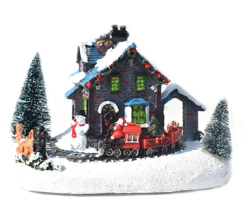 Luminous Christmas house decorations made of resin, with a warm glowing light creating a festive winter scene